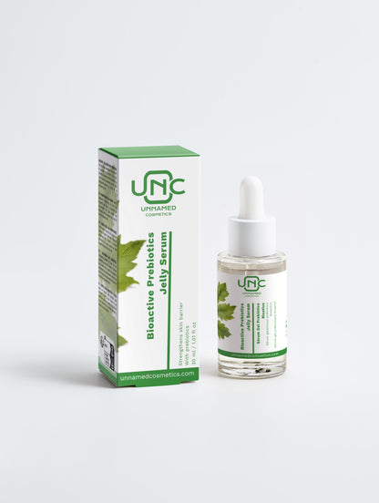 Serum Prebiotico Reparador Unnamed Cosmetics com frasco transparente e caixa verde e branca